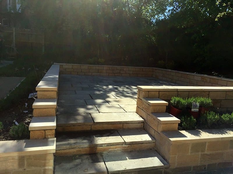 Yorkshire stone steps and paving between new stone garden walls, Park Avenue, Harrogate